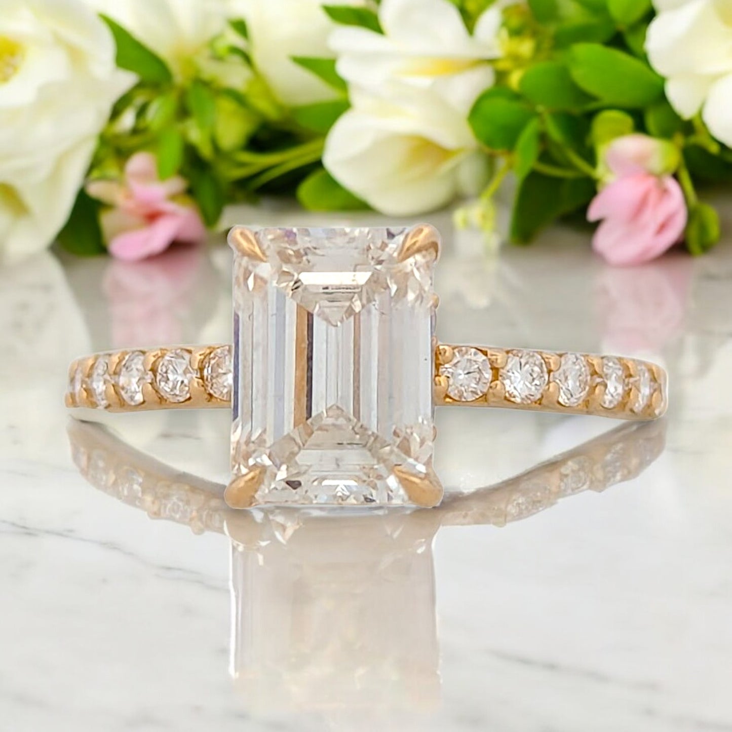 14k yellow gold engagement ring with 2.12 ctw emerald cut lab diamond, .40 ctw on shank, hidden halo, IGI VS2 F